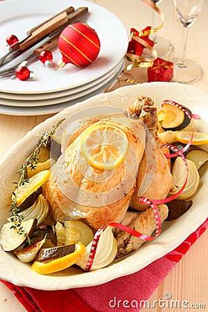 Roasted whole chicken with christmas decoration Stock Photo