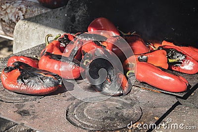 Roasting red bell peppers Stock Photo