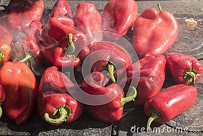 Roasting red bell peppers Stock Photo