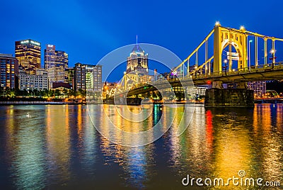 The Roberto Clemente Bridge and Pittsburgh skyline at night, seen from Allegheny Landing, in Pittsburgh, Pennsylvania Editorial Stock Photo