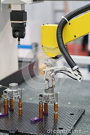 Robot arm auto load and unload CNC turning part Stock Photo