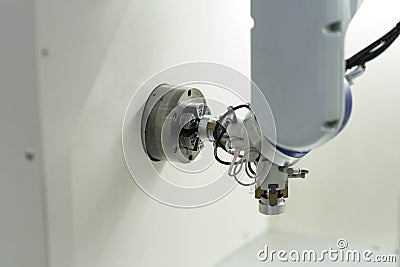 Robot arm auto load and unload CNC turning part Stock Photo