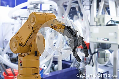 Robot arm in factory Stock Photo