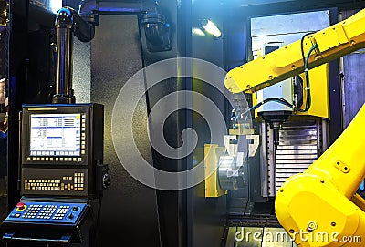 Robot arm motion blur in machine tool metalworking process for industry manufacture,CNC metal machining. Stock Photo