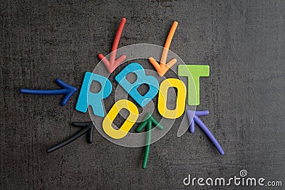 Robot or artificial intelligence concept, multiple arrow pointing to colorful alphabets building the word ROBOT on black cement Stock Photo