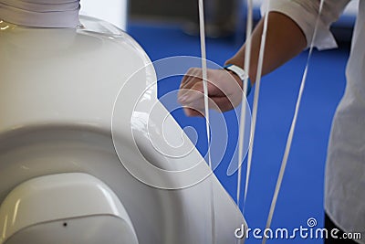 Robot, new model that joins the exclusive club of humanoid robots. The touch screen, curvy design.Service robots. Android robot t Stock Photo