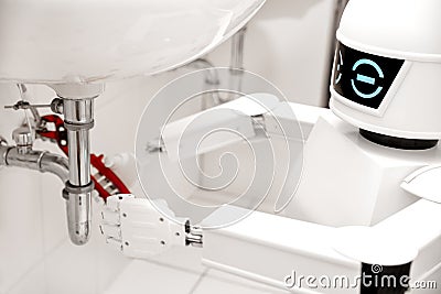 Robot repairs sunk pipes Stock Photo