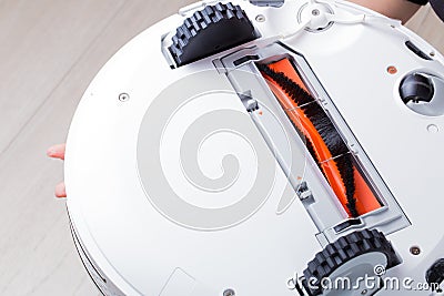 Robot vacuum cleaner upside down view Stock Photo