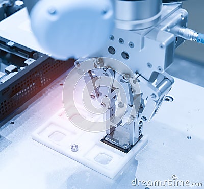 Robot with vacuum suckers with conveyor in manufacture factory Stock Photo