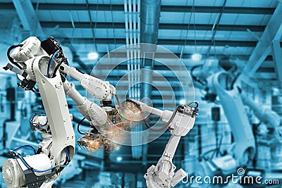 Robotic arms, industrial robots factory automation machines Stock Photo