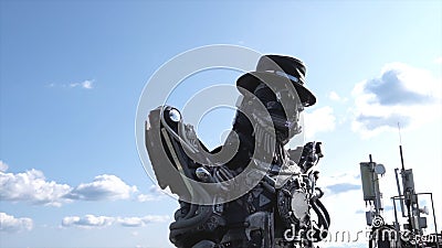 Robotic droids head and shoulders. Footage. Droid robot on background of sky with clouds. Technology concept Stock Photo