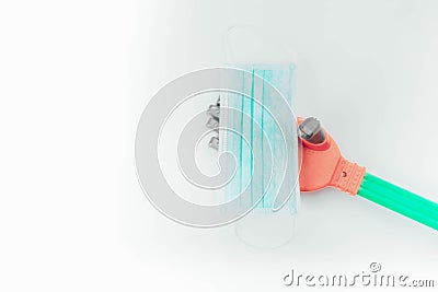 robotic hand holds surgical protection mask Stock Photo