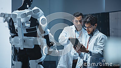 In Robotics Development Laboratory International Team of Engineers and Scientists Work on Robotics Stock Photo