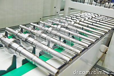 Robotized automated conveyor for detail supply into cnc machining center Stock Photo