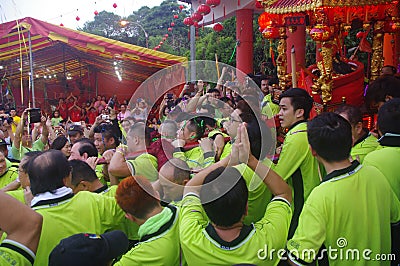 Robust devotees during Chingay festival Editorial Stock Photo