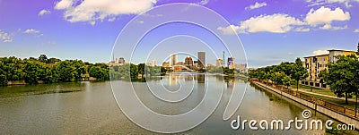 Rochester, New York, USA skyline viewed from the south at dusk with the Genesee River flowing toward the downtown area. Editorial Stock Photo