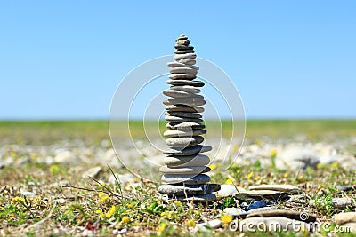 Rock balancing, stone stacks on the beach Stock Photo