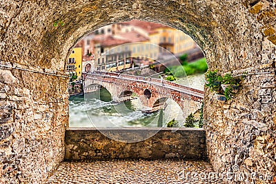 Rock balcony overlooking an ancient stone bridge in Verona, Ital Stock Photo