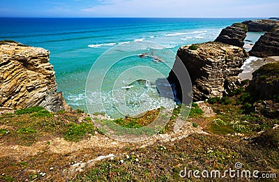 Rock at beach in summer day. Cantabric coast Stock Photo