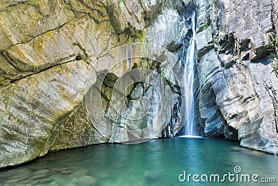 Rock,cascade and pond water Stock Photo