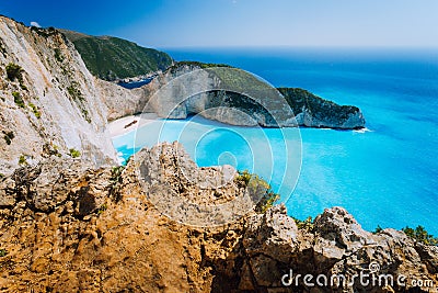 Rock Cliffs in front of Navagio beach Zakynthos. Shipwreck bay with turquoise water and white sand beach. Famous marvel Stock Photo