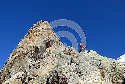 Rock climber on mountain top Stock Photo