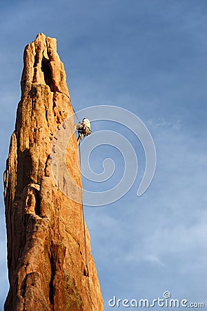 Rock Climber Rappelling Stock Photo