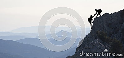 team spirit & Climbers in mountains & success Stock Photo