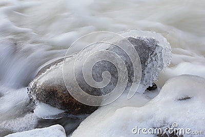 Rock covered with ice Stock Photo