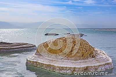 A rock covered in salt deposits at the dead sea, israel. Stock Photo