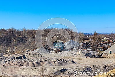 Rock crusher machine, crushing machinery, conveying crushed granite gravel stone in a granite quarry Editorial Stock Photo