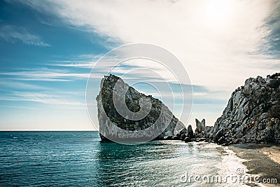 Rock Diva on beach, beautiful black sea shore landscape with mountain cliff, main nature landmark in Crimean Simeiz Stock Photo