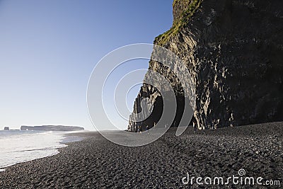 Rock formation on black sand beach Reynisfjara, Iceland Editorial Stock Photo