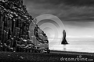 Rock formations in Reynisfjara Beach & Reynisdrangar Stock Photo