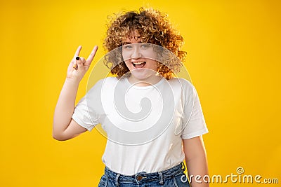 rock gesture body positive overweight happy woman Stock Photo