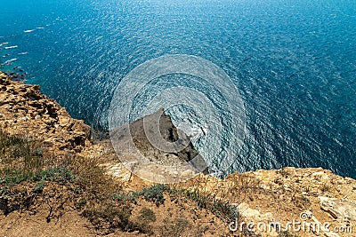 A rock invading the sea. Cape Fiolent, Sevastopol Stock Photo