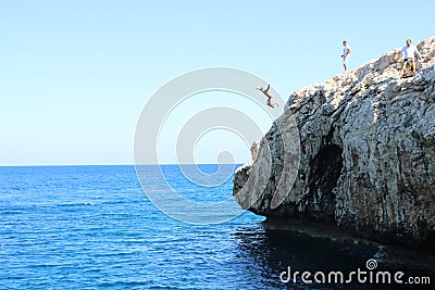 Rock jumping in beautiful Cyprus Editorial Stock Photo