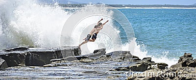 Rock Jumping Maloolaba Sunshine Coast Queensland. Editorial Stock Photo