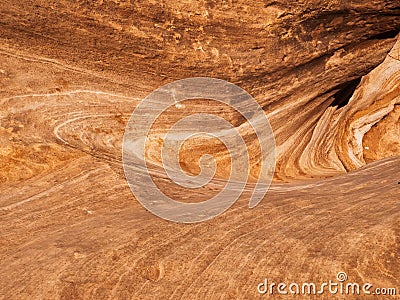 Rock layers and erosion create swirl pattern Stock Photo