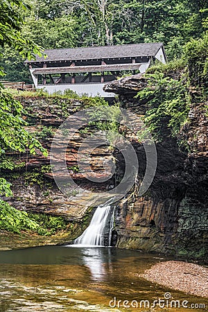 Rock Mill Covered Bridge and Hocking River Waterfall Stock Photo