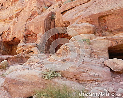 Rock with niches in Petra, Jordan Stock Photo