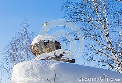 A rock with an Orthodox cross. Mountain Church. Resort Belokurikha Stock Photo