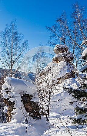 A rock with an Orthodox cross. Mountain Church. Resort Belokurikha Stock Photo