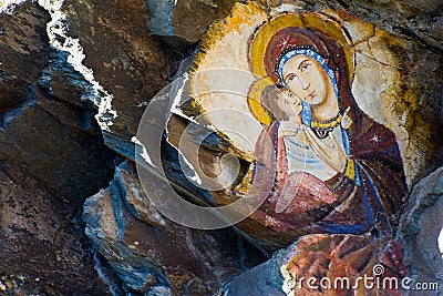 Rock painting of virgin mary and jesus Stock Photo