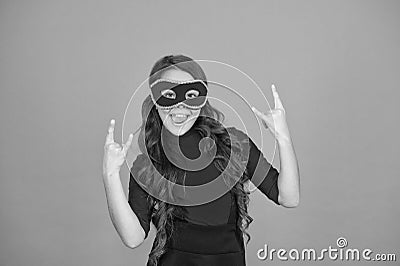Rock this party. Visit public event anonymously. New year party. Carnival party. Masquerade concept. Kid wear eye mask Stock Photo