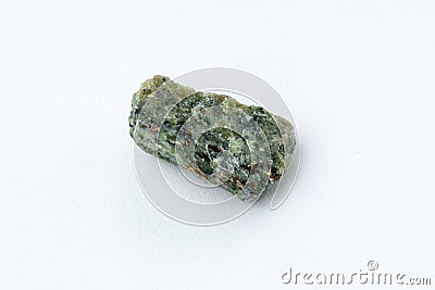 Rock with peridot olivine mineral, white background. Close-up. Stock Photo