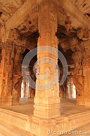 Rock pillar carvings - Vijaya Vitthala temple at Hampi, Karnataka - archaeological site in India - India tourism Stock Photo