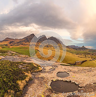 Rock Pools, Peaks and Clouds Stock Photo