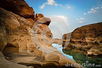 rock and river on blue sky,Sam-Pan-Bok Grand Canyon Ubon Ratchathani Thailand Stock Photo