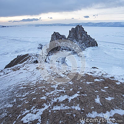 Rock Shaman. Lake Baikal, winter. Cape Burhan landscape. Stock Photo